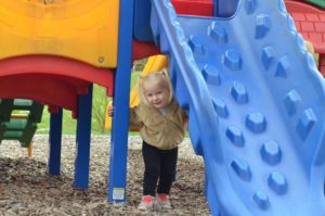 Girl playing on playground